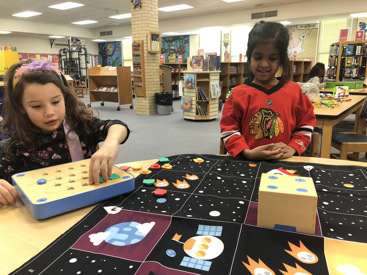 lsconley's tweet photo. We’ve been celebrating the #HourofCode the last two weeks with coding challenges, robots and Cubetto! Future coders in action! #WeareD97 #libraries97 #oakpark97 #whittierschool97 https://t.co/Qnl789myEs