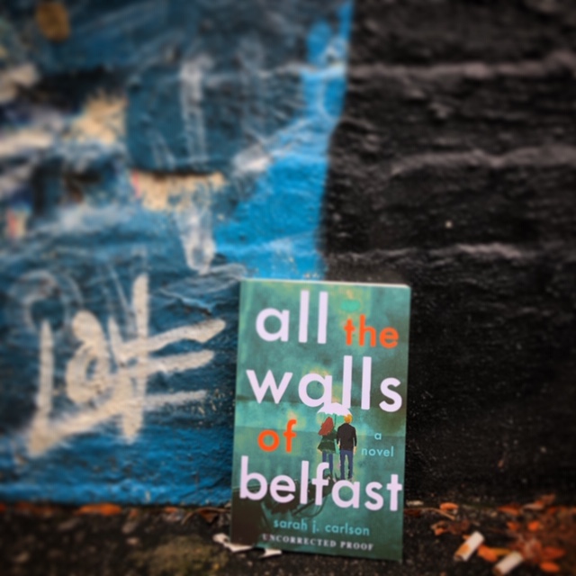 sarahjoydrop's tweet photo. A1: Cannot believe it's our last #Novel19s chat. My debut is #allthewallsofbelfast. Set in post-Troubles Belfast, Northern Ireland, it's about two teens grappling with their parents' paramilitary pasts. Booklist called it "an endearing story full of pain, love, and strength." https://t.co/0ScsETEkXx