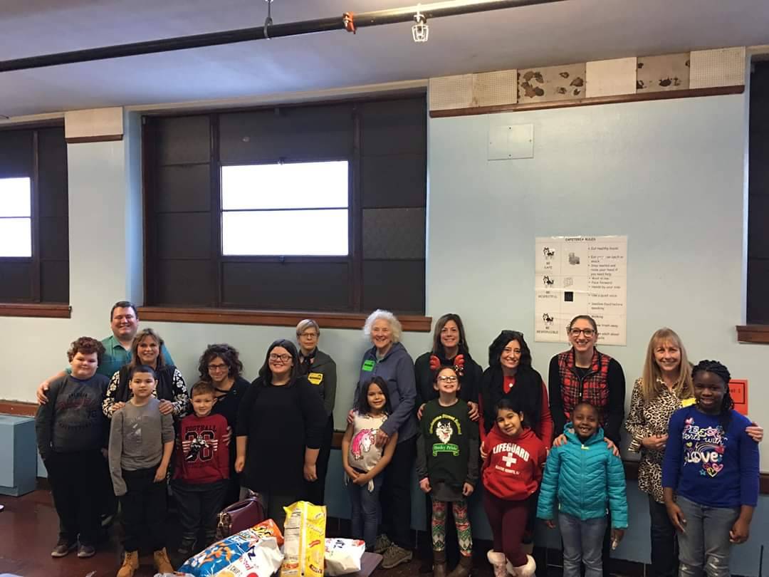 Gladstone_ES's tweet photo. So many jolly faces at the Mentor RI Holiday party! Thank you to all of the mentors and mentees for getting together to celebrate a successful first 4 months. https://t.co/6WUbWqyn8M