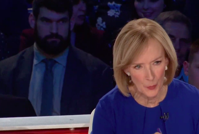 sllambe's tweet photo. Currently writing a sexy espionage thriller starring Henry Cavill as the bearded bae sitting behind Judy Woodruff at the #DemocraticDebate https://t.co/ch5OM1LsEC