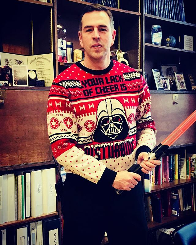 sewfalcons's tweet photo. Mr. Cugini showing his #wagnerspirit2019 with ugly “SITHmas” sweater. Happy holidays everyone! @sibod31 #WagnerPride #sistrongertogether @vgallassio https://t.co/MmQbeLTpNg https://t.co/TDwTgl4jkC