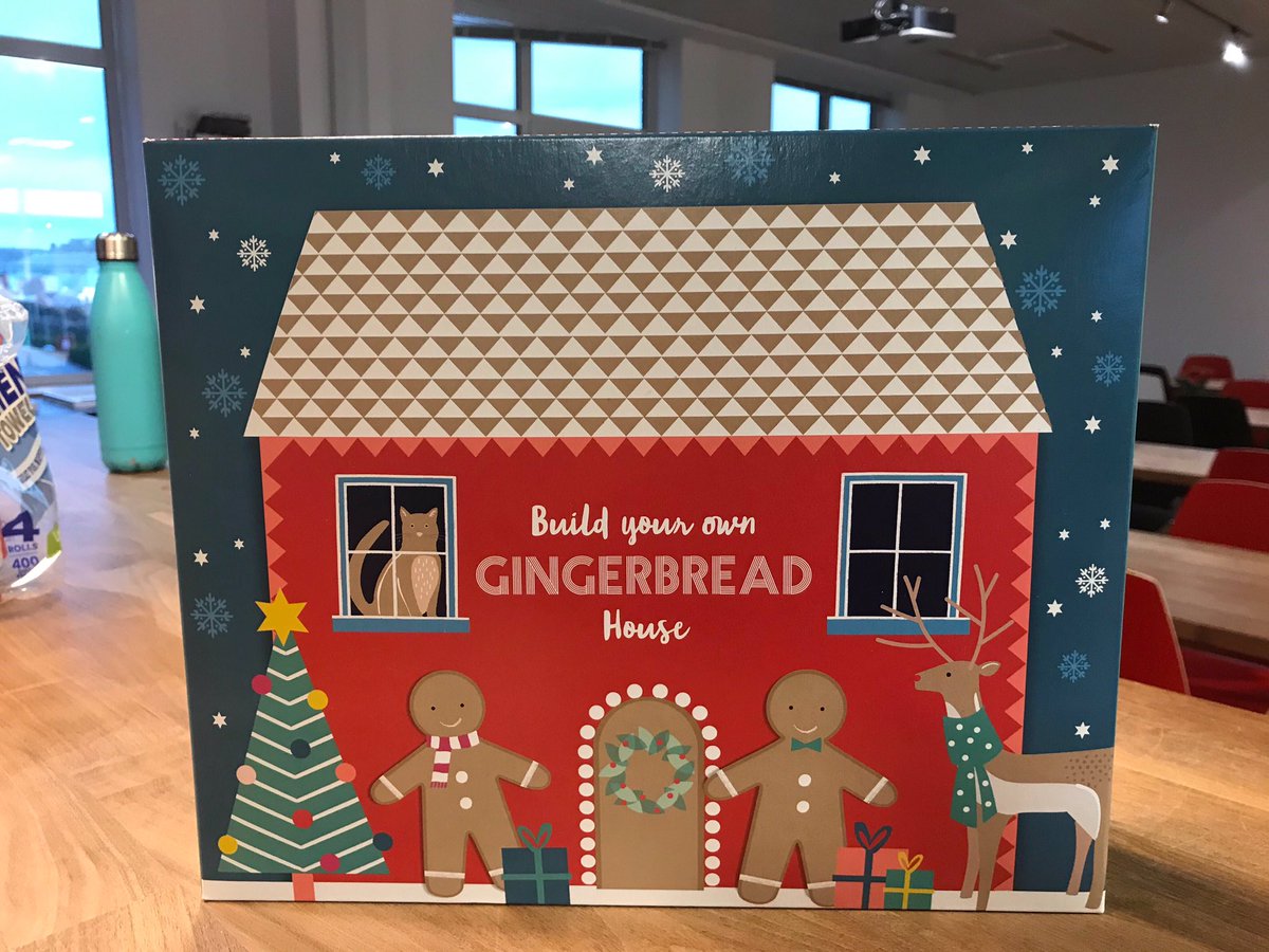 CreditsafeBay's tweet photo. We thought we would have a little #Christmas cheer in our Creditsafe kitchen this week and build our own little gingerbread house! #teamwork https://t.co/dFTPLaQJ3X