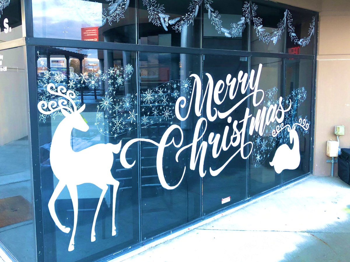 Window painting fun. #freehandpainter #windowpainter #windowart #christmaswindow #MerryChristmas #snowflakes #reindeeer #handlettering
