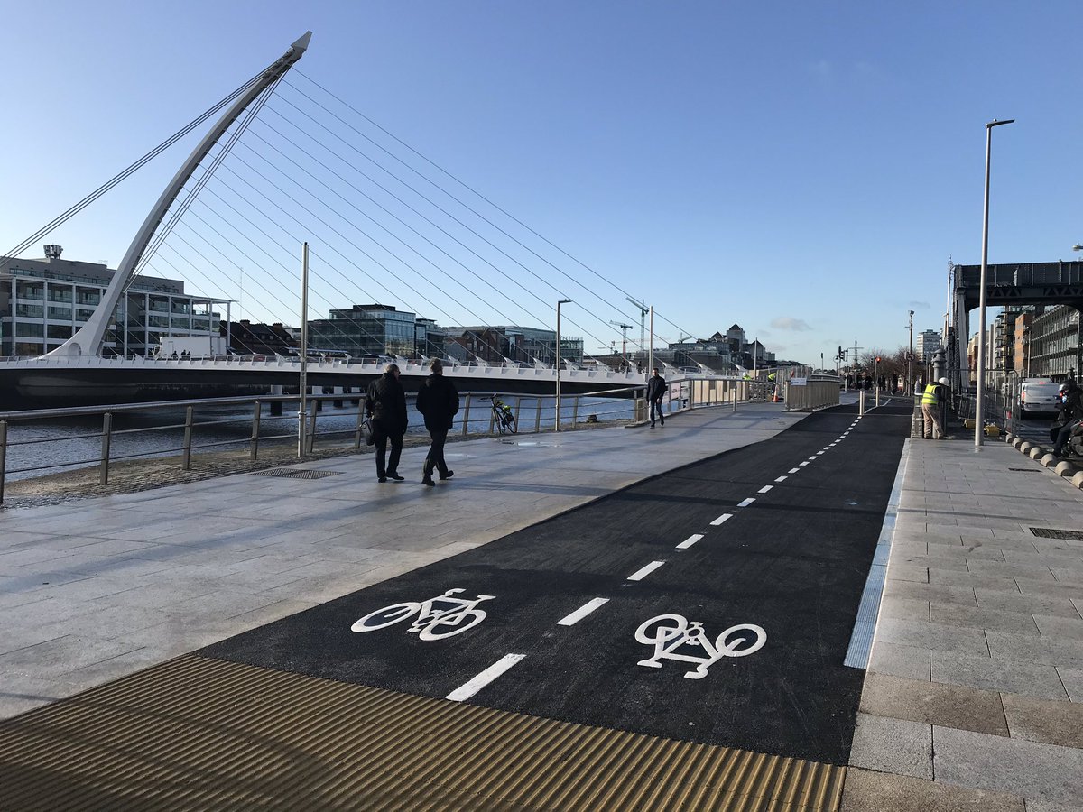 GraemeMcQ's tweet photo. Nice early Christmas present for cyclists and pedestrians in Dublin... new segregated bridges opened today outside @theccd. Removes a real pinch point for those walking and on bikes. #betterdublin https://t.co/kb2hXAwYdS