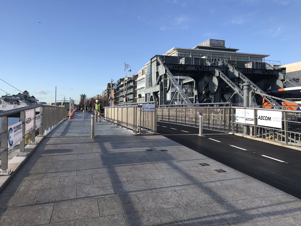 GraemeMcQ's tweet photo. Nice early Christmas present for cyclists and pedestrians in Dublin... new segregated bridges opened today outside @theccd. Removes a real pinch point for those walking and on bikes. #betterdublin https://t.co/kb2hXAwYdS