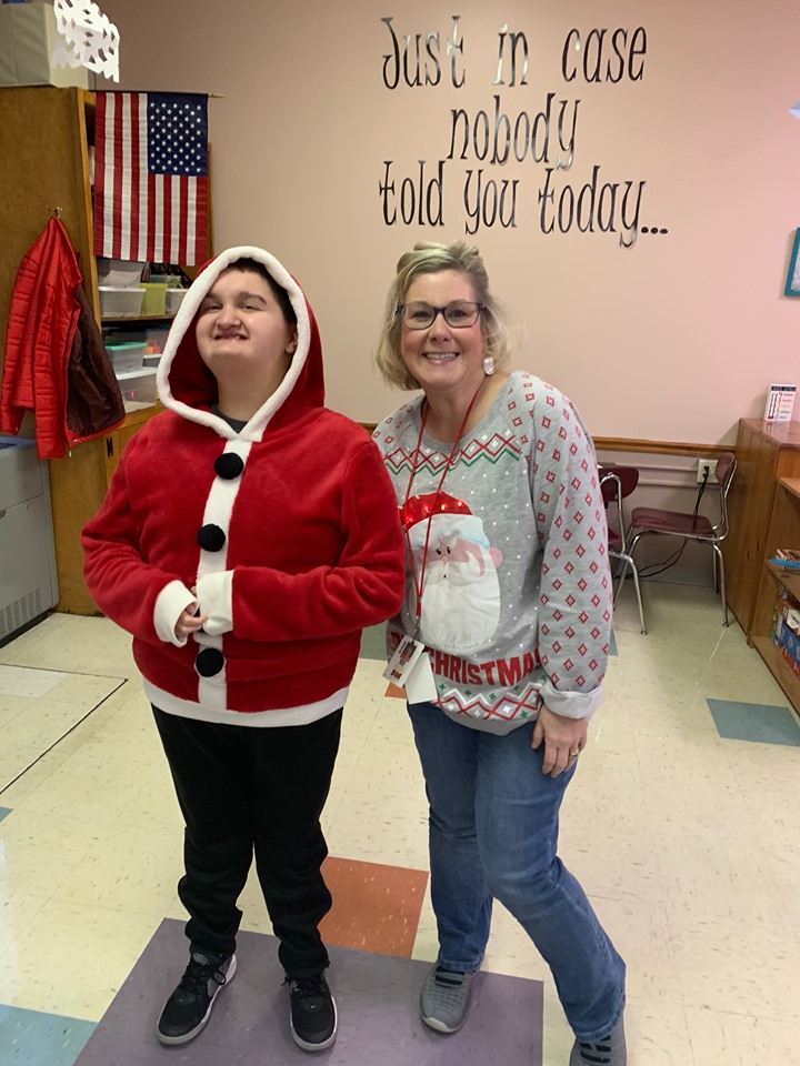 FMTigers's tweet photo. It's festive here at FM today!   One of our newest staff members is decking the halls as a Christmas Tree!  We are enjoying this day and looking forward to break! https://t.co/c7rbjTtLca