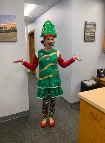 FMTigers's tweet photo. It's festive here at FM today!   One of our newest staff members is decking the halls as a Christmas Tree!  We are enjoying this day and looking forward to break! https://t.co/c7rbjTtLca