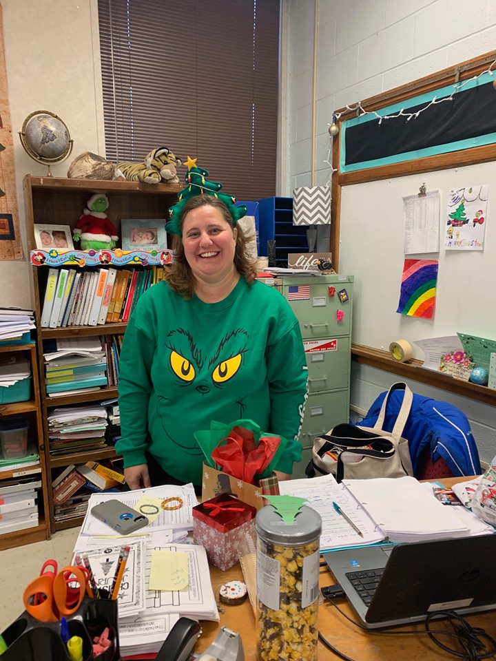 FMTigers's tweet photo. It's festive here at FM today!   One of our newest staff members is decking the halls as a Christmas Tree!  We are enjoying this day and looking forward to break! https://t.co/c7rbjTtLca