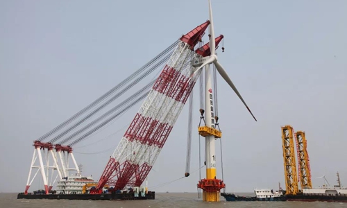 China's first offshore wind farm with foreign investment and the country's farthest and most challenging wind farm was put into use on Wednesday in E China