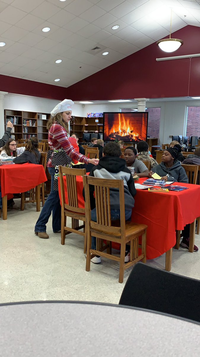 SCMS 6th grade students enjoying the Book Buffett in the media Center with @tyreeteach