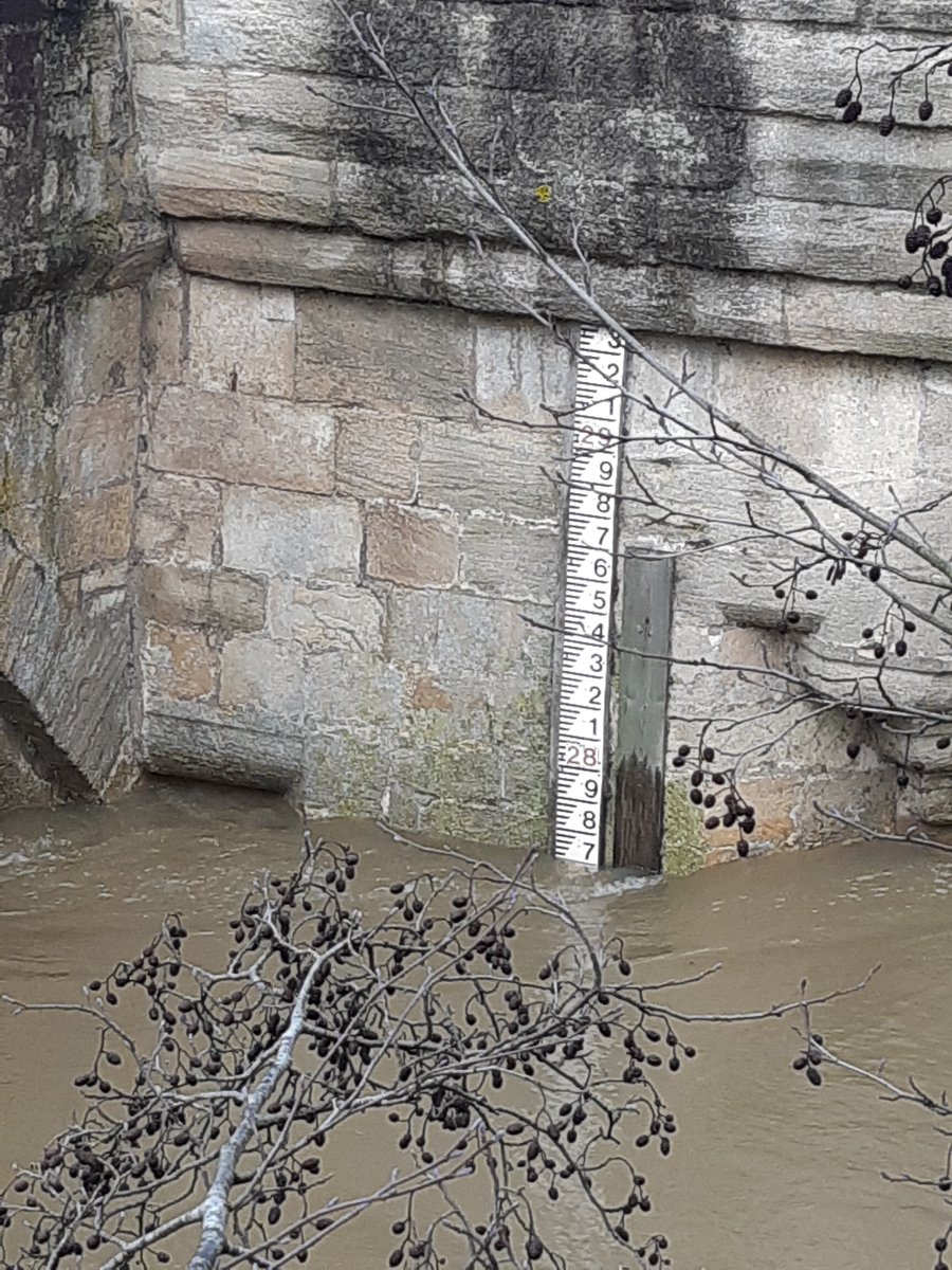 BoATCCEVs's tweet photo. #floodalert #bradfordonavon. Thank you to The Mayor for the 13:00hrs report. The level has crept up very slightly and is now 27.7m AOD. Barriers are all in place. @EnvAgencySW @bbcwiltshire @WiltshireWinter @DWFRSBoA @WiltsPrepared @BoATownCouncil https://t.co/dLAA6iFP1Q