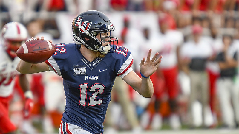 ASeaofRed's tweet photo. Liberty QB Buckshot Calvert returns to the Sunshine State for final curtain call
https://t.co/d1pUjVDxmW https://t.co/62KTff1L43