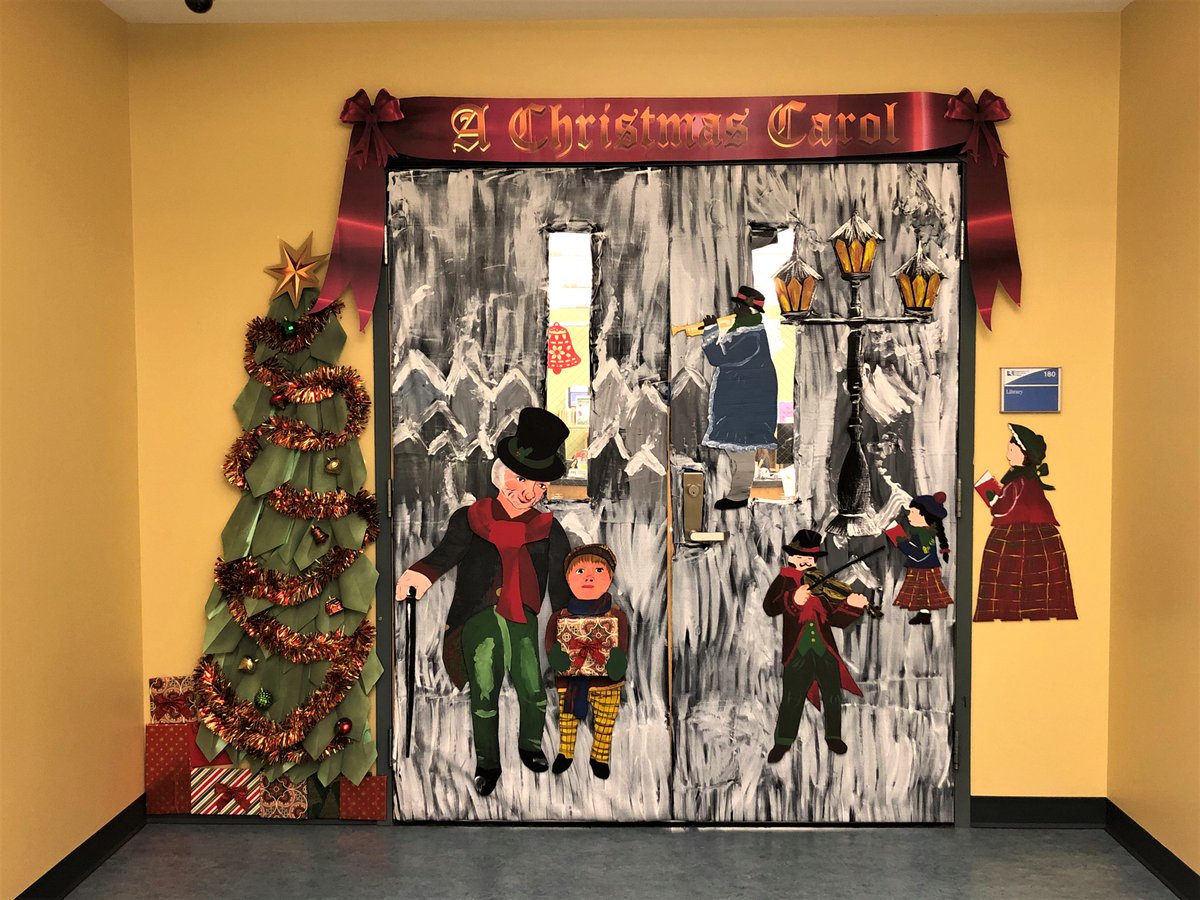 rappacoco's tweet photo. RCC's campus libraries at Glenns and Warsaw won the RCC Staff Association's Holiday Door Decorating Contests (Glenns at left, Warsaw at right). Congratulations to the library staff and their primary door artists- Jane Spencer at Glenns &amp; Molly Robinson at Warsaw @rappahannock_cc https://t.co/d6nuFty02W