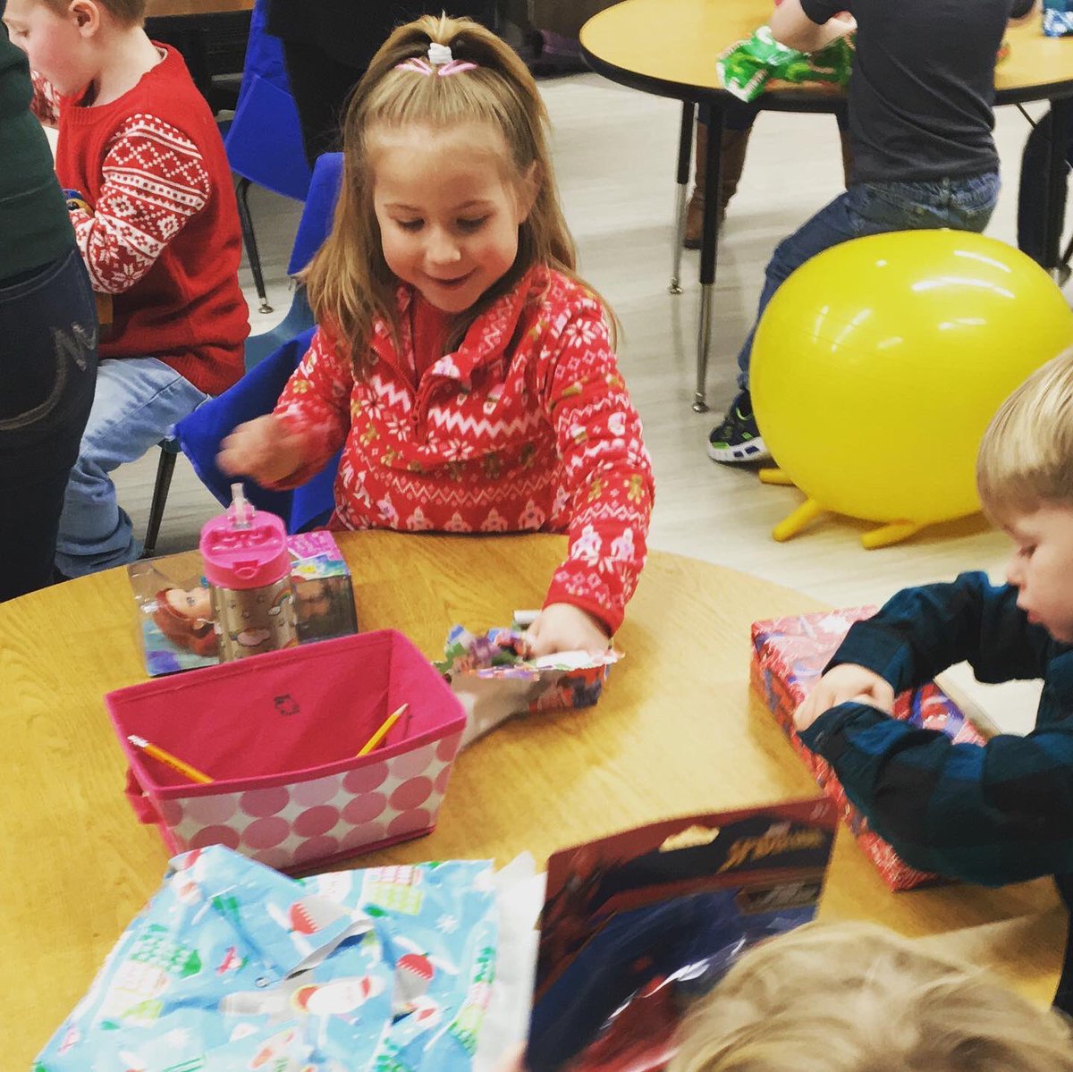srfcsd's tweet photo. #Christmas time is so special and so are our kindergarteners! They exchanged gifts and had a special visitor come to deliver gifts of hats and mittens! #srfcsd #srfsaints #mrsluceyismagic https://t.co/sYHakgehnz