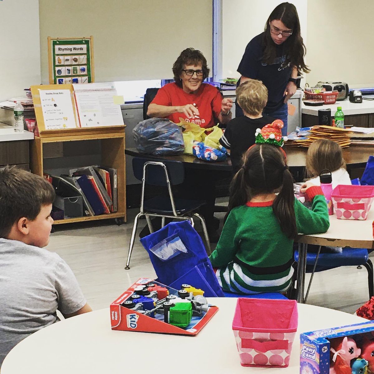 srfcsd's tweet photo. #Christmas time is so special and so are our kindergarteners! They exchanged gifts and had a special visitor come to deliver gifts of hats and mittens! #srfcsd #srfsaints #mrsluceyismagic https://t.co/sYHakgehnz