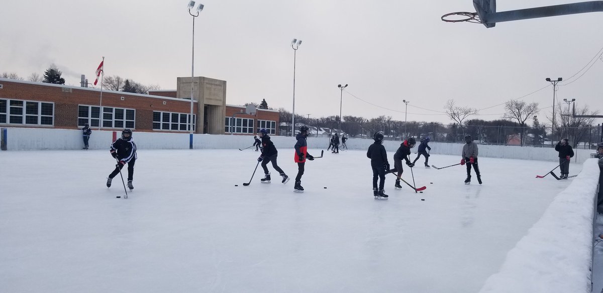 ERHS1947's tweet photo. Last day before break fun! Outside on the rink at @CorydonCC with our beautiful school in the background! https://t.co/hfOwcN8Zjc