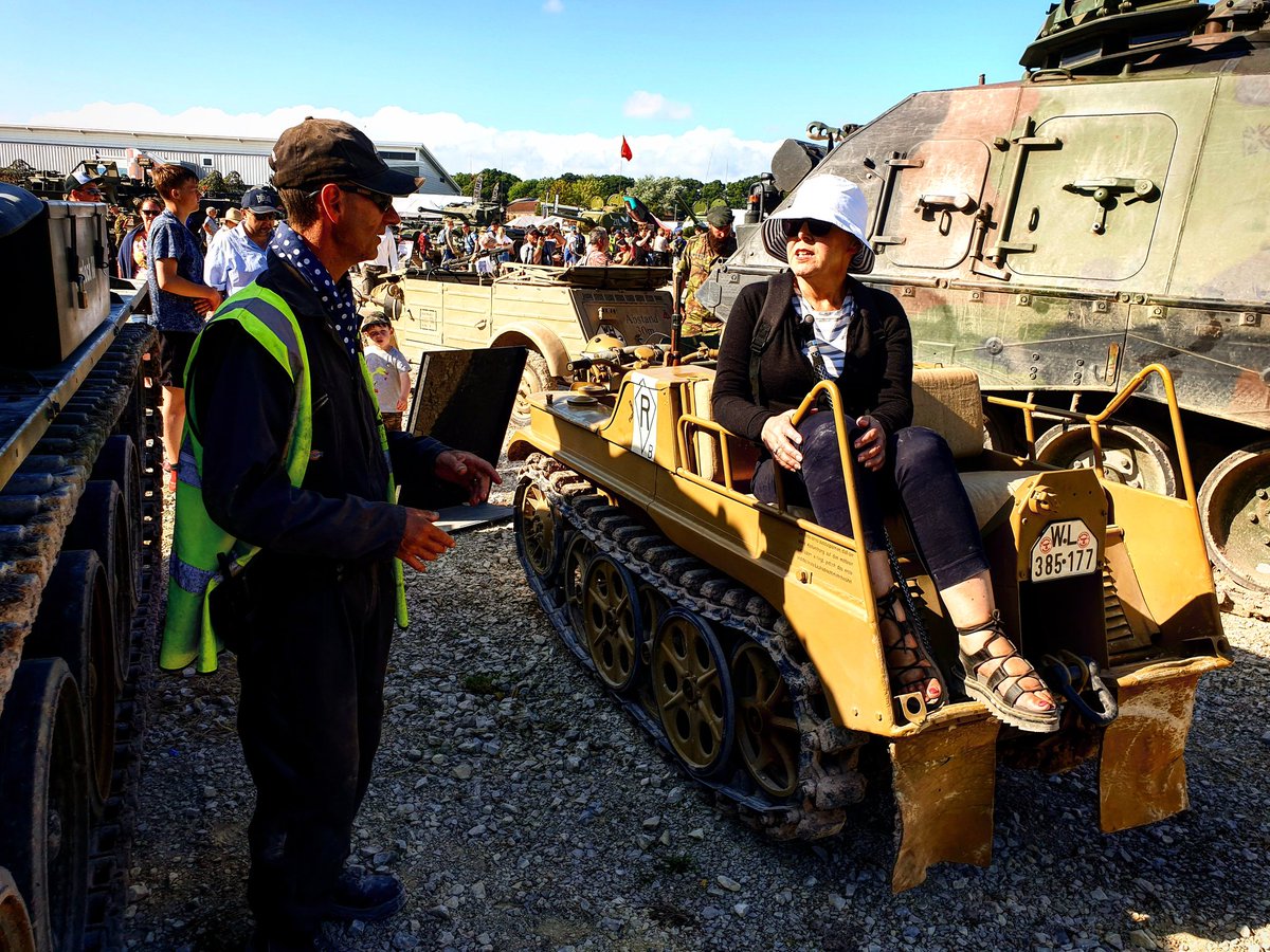 We went to Tankfest at the tank museum. She loved it. Here she is sitting in the back of a "Kleines Kettenkraftrad HK 101", a German WW2 era half track motorcycle.