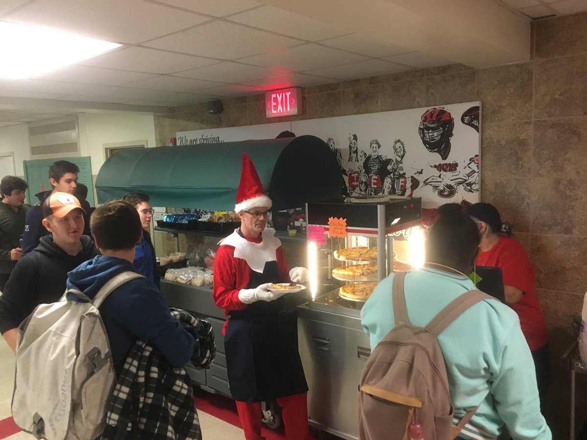 sports_unified's tweet photo. Iroquois Elf serving pizza at the lunch cart. Looks good! #chiefelf https://t.co/buEq77kHUf