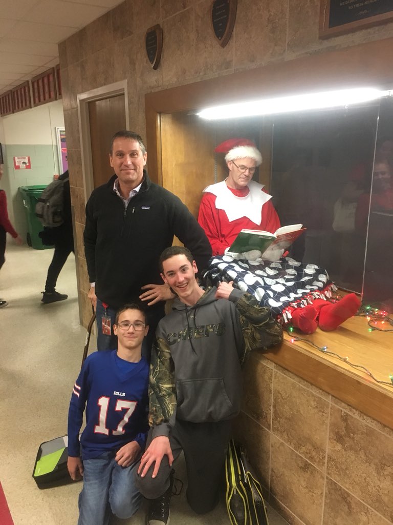 sports_unified's tweet photo. Elf reading The Grinch here at Iroquois! #chiefelf https://t.co/EwVP8rsHc3