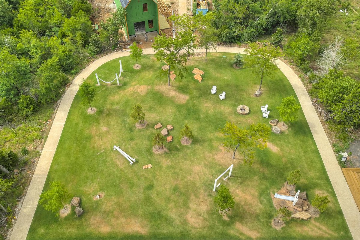 Our home site at 76 Pistache is located among the horseshoe surrounding Pistache Park neighborhood. A verdant and peaceful area equipped with hammocks, swings, a firepit, and a slide make this the perfect spot for recreation and relaxing.