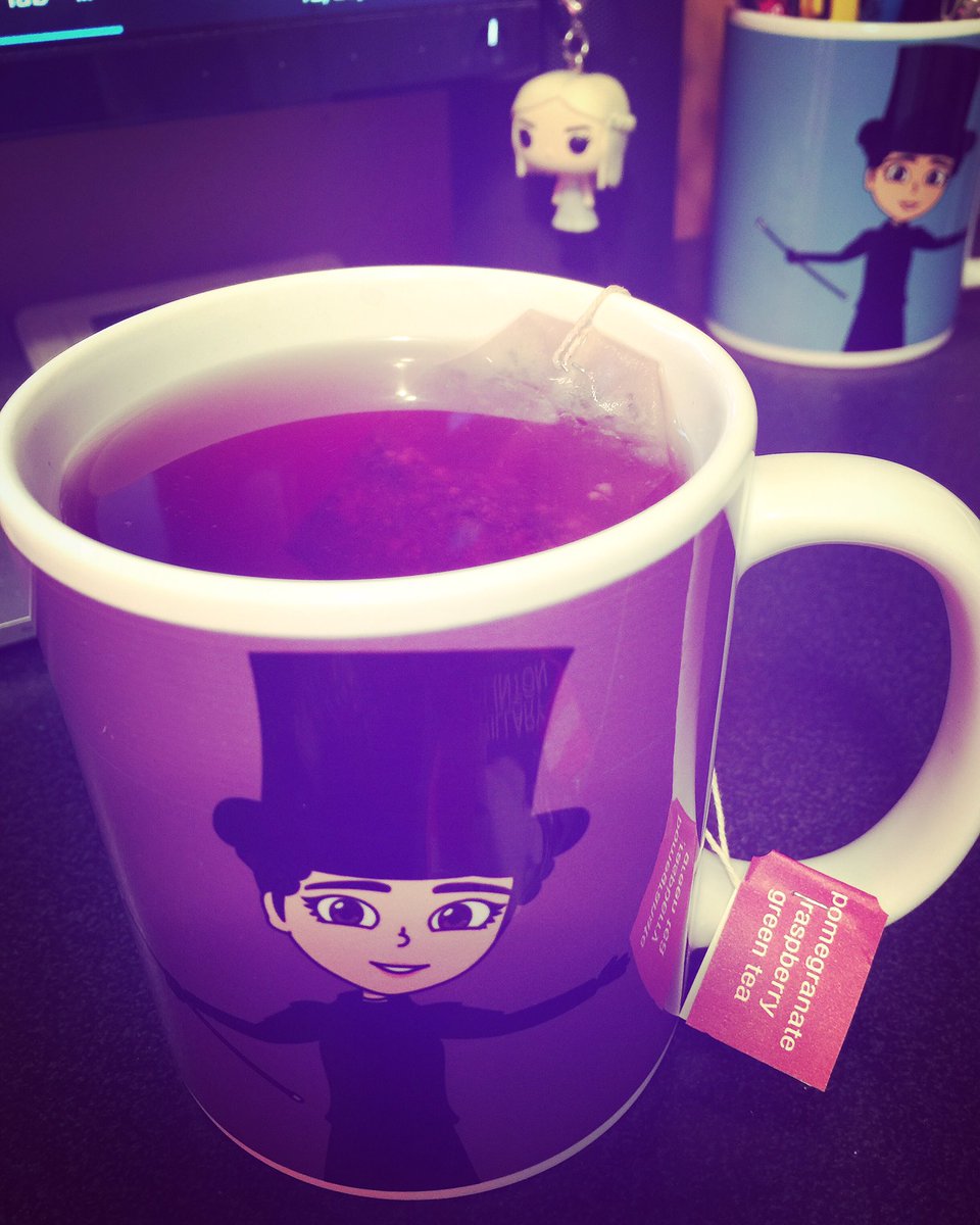 debrapalermo's tweet photo. Having a cup of #gaytea in my #AnneLister @ladycreaturee ME mug. I’m drinking #PomegranateRaspberry for the first time. It’s very delicious and it’s the same color as #GentlemanJack’s background! “Mmmm Mmmm Good Lord”! #FridayFeeling #SuranneJones ☕️💜🎩 https://t.co/TYKBp4yIVW