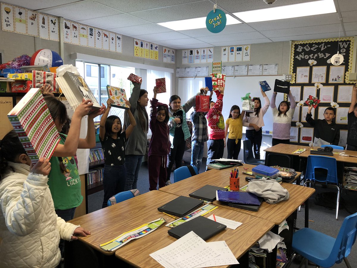 Holiday book exchange this year was a hit! Loved the joy and excitement these kids had as they unwrapped their books! #RioLindo #RioSchools