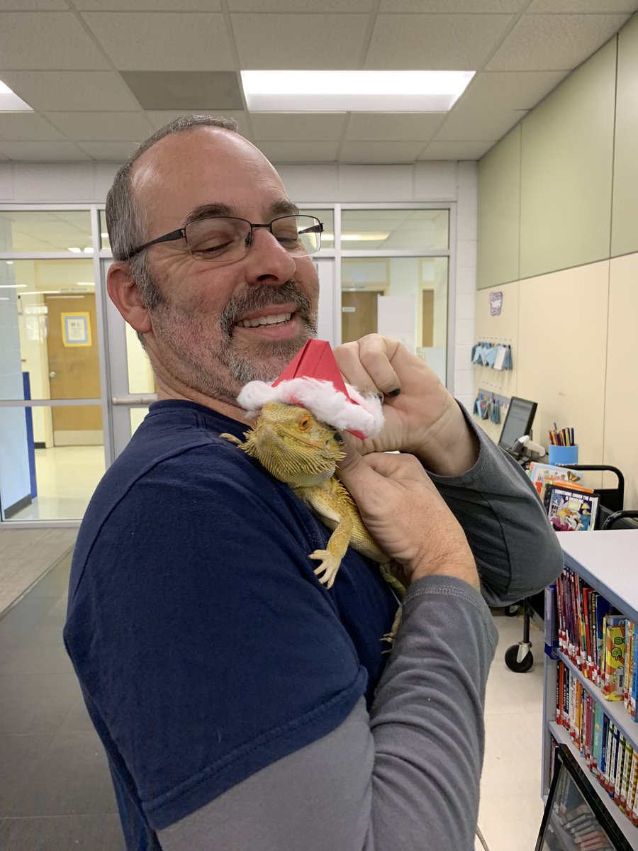 CEMediacenter's tweet photo. Dart the Library Dragon says Happy Holidays to everyone this holiday season.  @OrangeCoSchools @Central_ElemE4E https://t.co/mXGAZYxNIo
