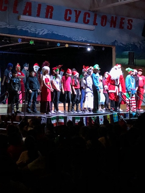 fd_sinclair's tweet photo. The #Grade7 classes put together a fantastic holiday play for our school community - thank you to Ms. O'Malley and Ms. Reid for all of your creative ideas! Santa was helped by a host of friends to overcome his case of Christmas blues! #BlueChristmas #sinclairlearns #sd36learn https://t.co/B0G4FG00qh
