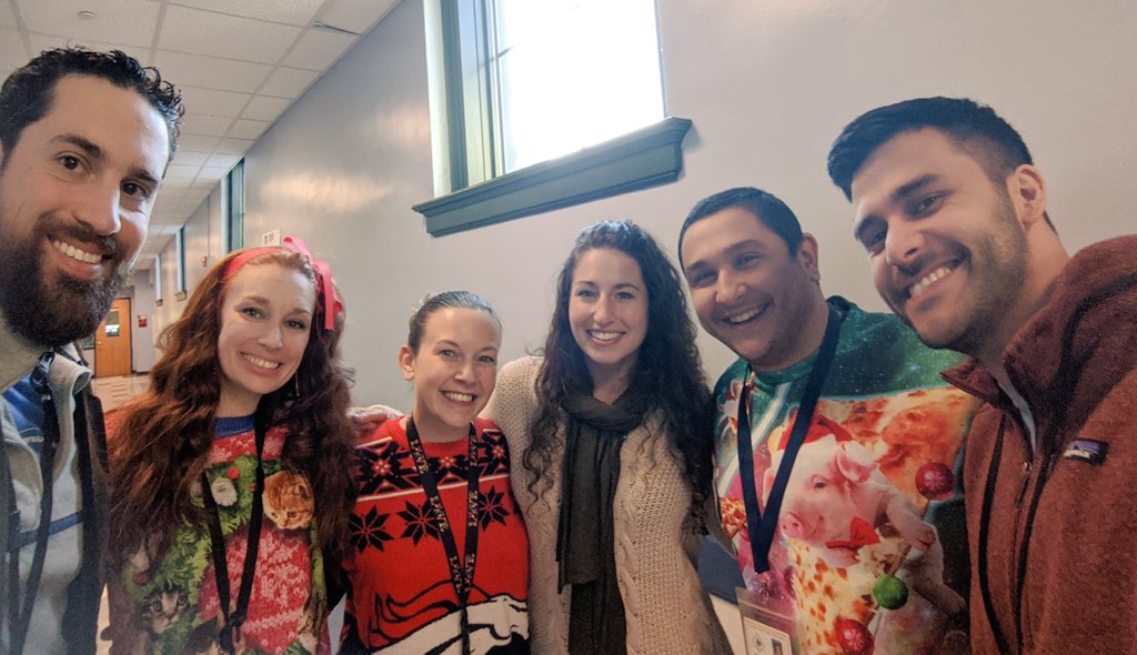 The 8th grade team celebrating the ugly sweater winner, @MrShakerSMS 🐾❤️ 🎄⛄