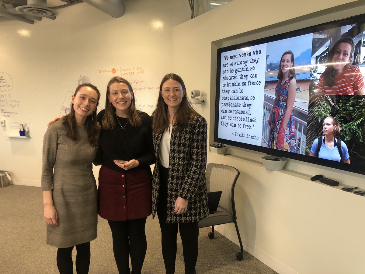 Meaghan receives her prism award from Meg and Madison.  Posing with award.