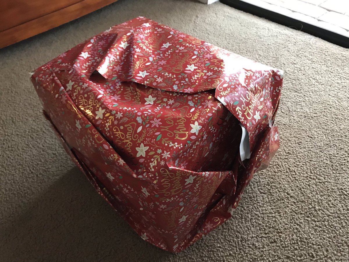 JimMcIlvaine's tweet photo. In my defense, I had to conserve a limited amount of tape and found it to be of inferior quality #wrappingfails https://t.co/rIqTBnMXAR