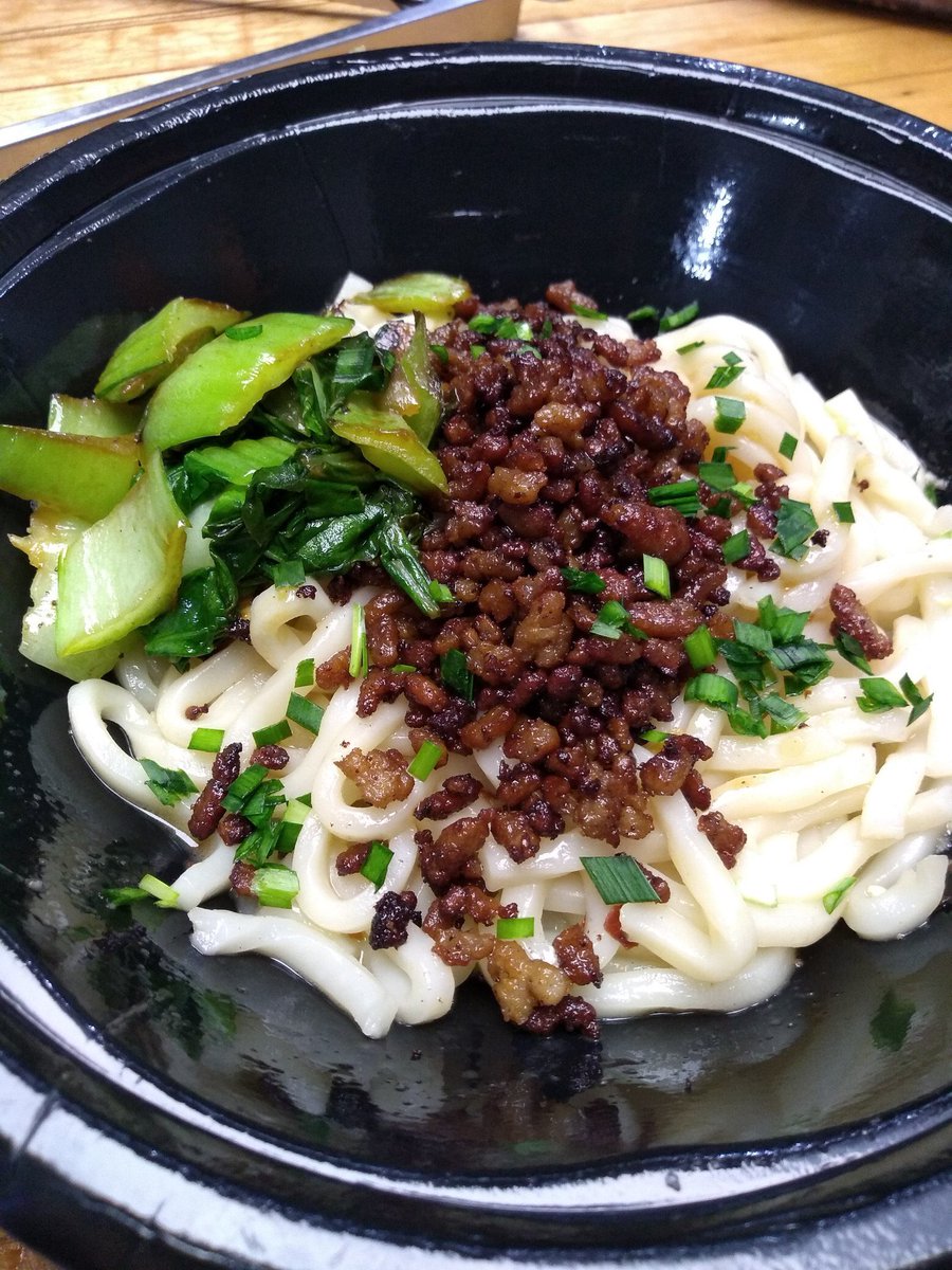 Sesame chilli oil noodles with leafy greens bok choy and spinach topped with sweet crispy pork, dan dan noodles tonight.  #mcallen #beergarden