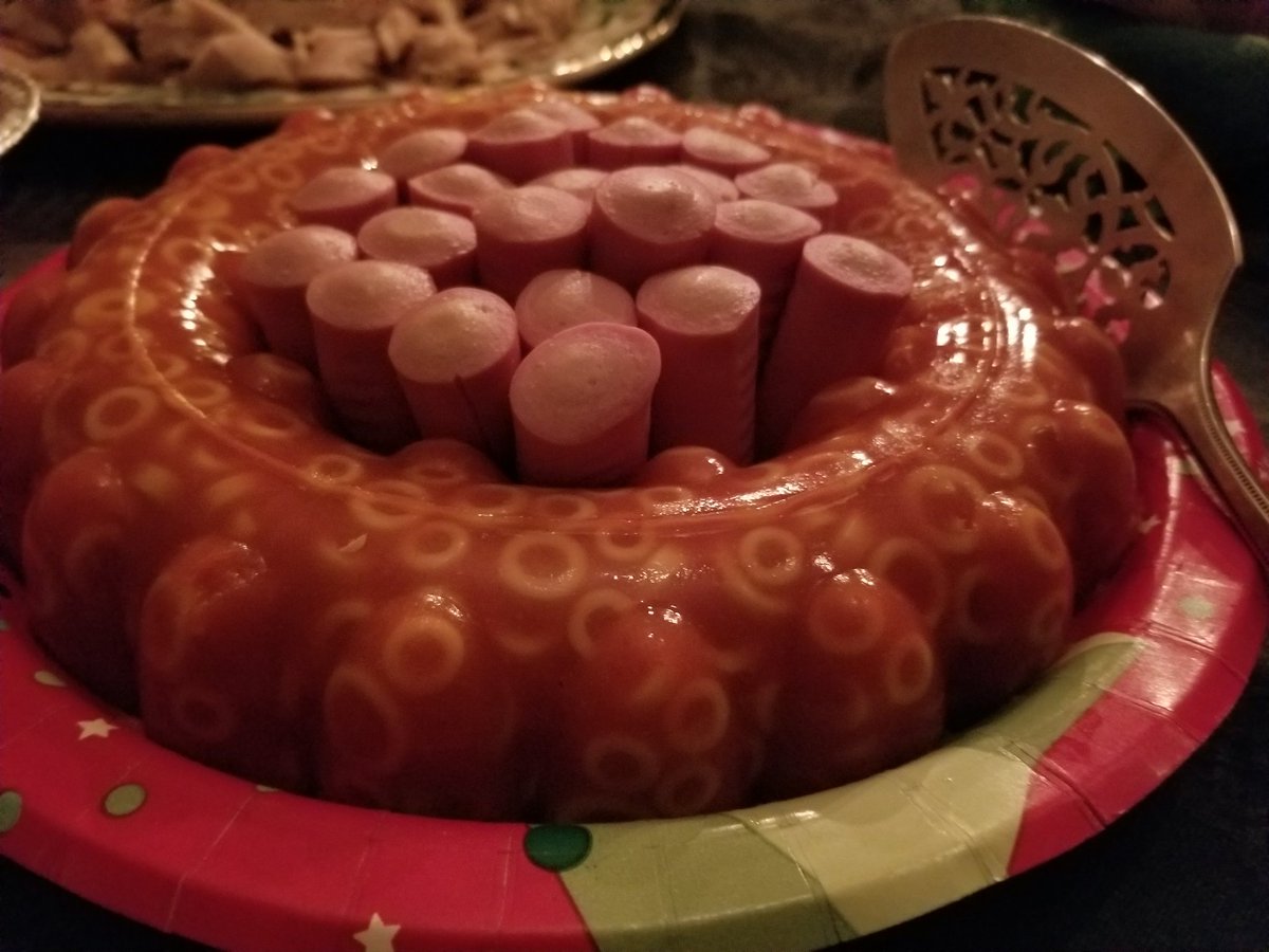 At a holiday party this evening and this dish was on the table, brought by a guest. Spaghettios aspic ring around vienna sausages. I can't tell if this is diabolical or brilliant. Maybe both.