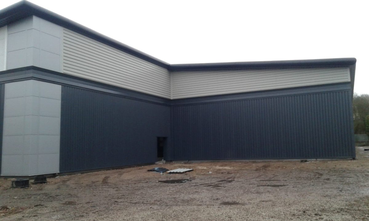 DonkinGroup's tweet photo. Another project completed today in the Midlands, completed on time once again by BD Roofing's expert operatives, in this instance, a 2 unit site totalling 30,000 sq.ft with a @firthsteels Protex system to both roof &amp; walls along with more bespoke PPC items from BD Fabrications https://t.co/cKBGQyk0Gn