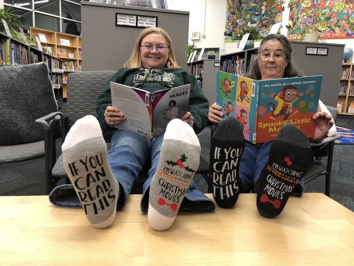 aud_drew's tweet photo. One of our awesome families gifted us these fun socks😀They know us well! #TurnagainLib #libraries #ElementaryChristmas https://t.co/w4jtoqwaIN