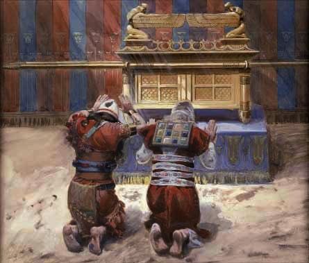 The Ark Of The Covenant holds the covenant from God to man & that is physically, the two tablets representing the Ten Commandments.Moses was given specific instructions on how the Arch was to be constructed & he followed them perfectly.