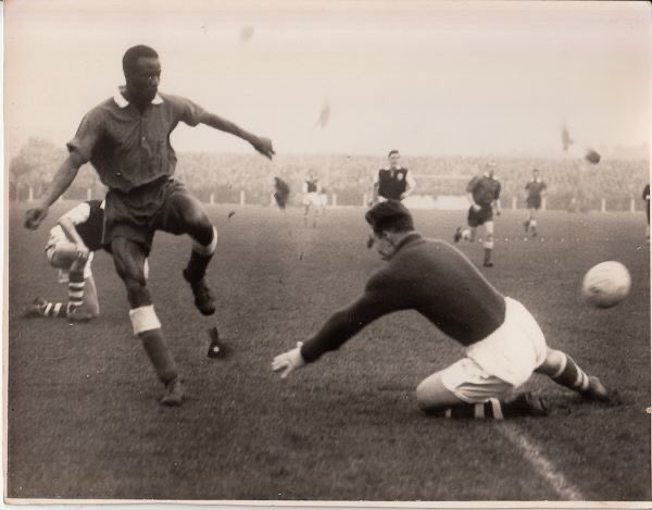 In 1955, he went to England as an apprentice Printer and later signed for Peterborough United becoming the first African professional to play in the UK. He also played for Queens Park Rangers, Holbeach Utd and Skegness.