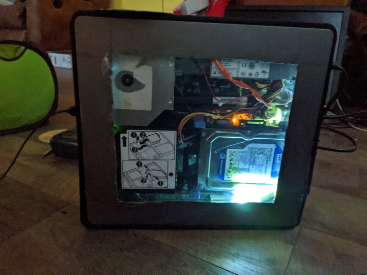 MistyEwry's tweet image. Huh...back together and #stillworks. Cut out the cover, used plexiglass to protect the parts, and added a light. Calls it his gaming computer.  #thiskidisamazing #Autism #autismawareness