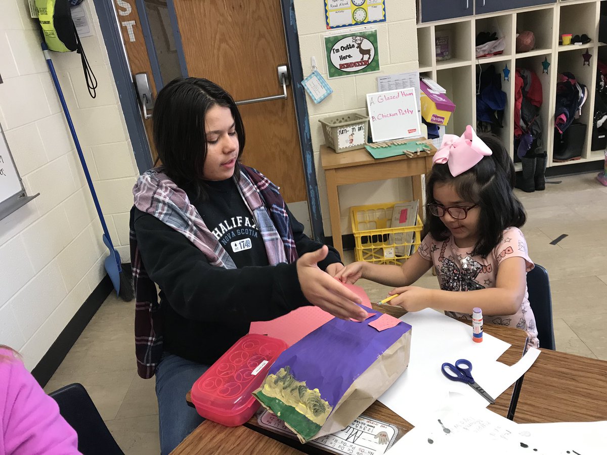 GrahamTeach1's tweet photo. I think two types of communities were being built this week...one out of paper and the other between students. Thanks @CourtneyPfizen4 for bringing your 8th graders to help with this project. We loved having you! #Lincoln379 #USD379 https://t.co/gIui0HmyGY