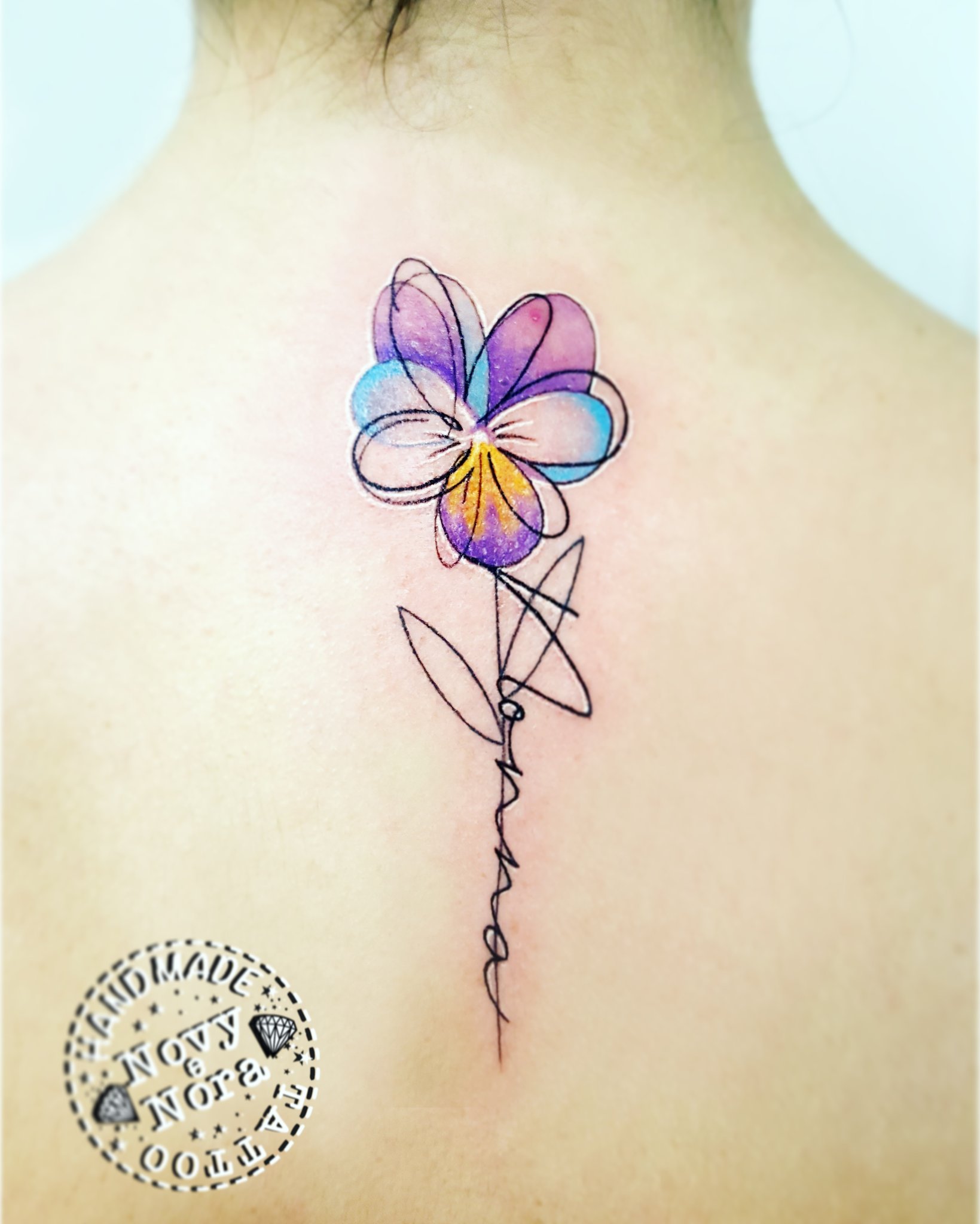 violet watercolor tattoo