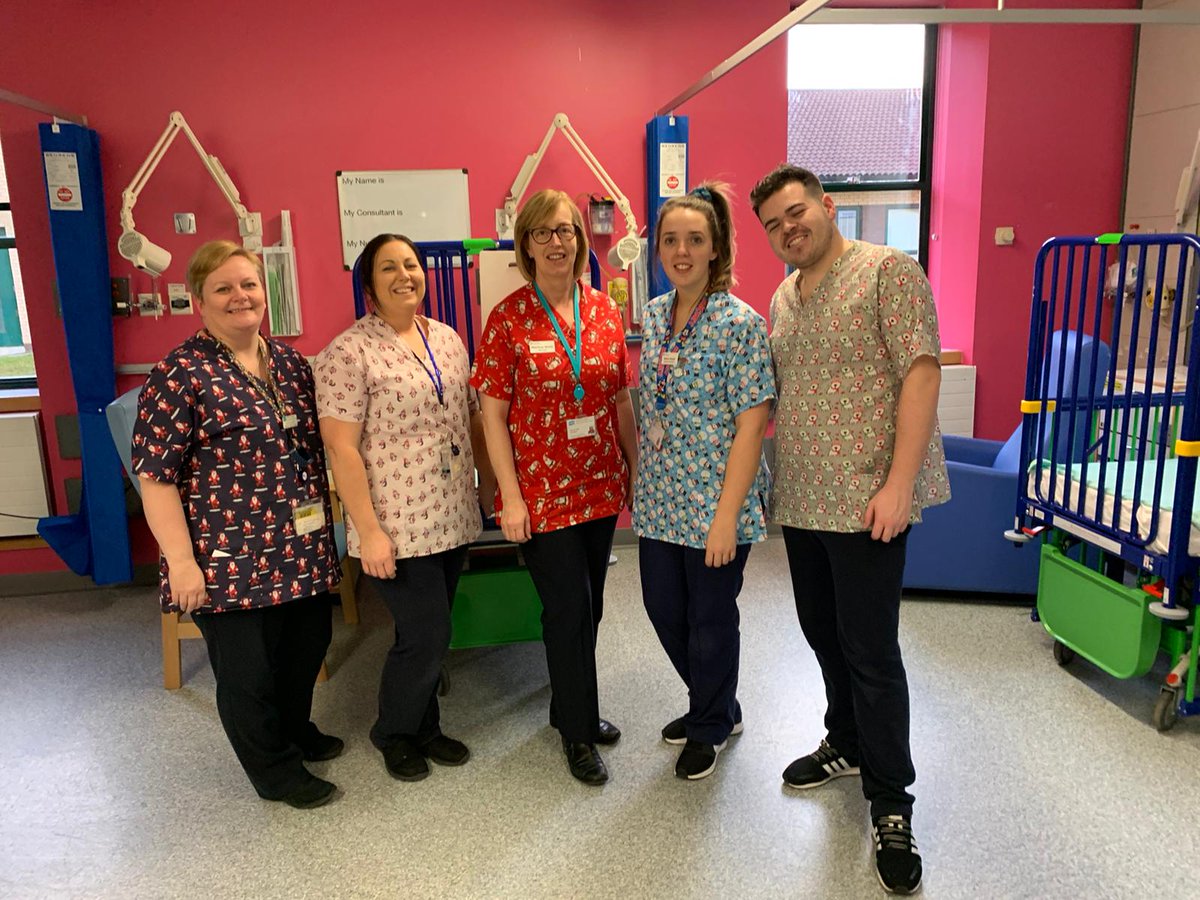Cheryl99131514's tweet photo. Delighted with our new Christmas themed uniforms being worn on Ward A2 🎄🎅🏻 Great to see everyone looking &amp; feeling festive through my ongoing IQI project! Can’t wait to see the positive impact they have #A2getsfestive #paedsward @NHSCTrust @realgraceedge @maeveymint @e_mceneaney https://t.co/LAq7QHMATJ