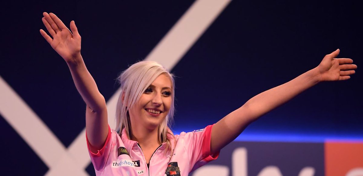 BBCSport's tweet photo. She's done it! 

Fallon Sherrock has parachuted herself into darts superstardom. 

She has beaten Mensur Suljovic 3-1 to book her place in the Third Round of the PDC World Championship on a bull finish. #WorldDartsChampionship https://t.co/tuzbvH9w87