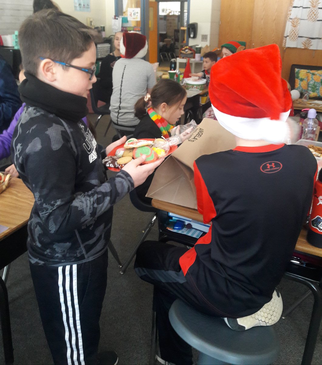 NS_Grade4's tweet photo. Oh what fun with a #holidaycookie swap on #UglySweaterDay https://t.co/Bq2WJ6swvR