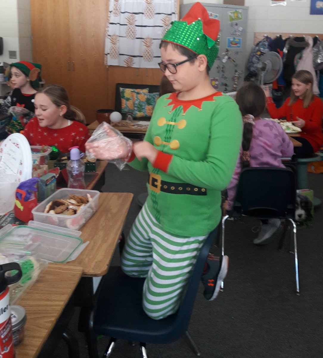NS_Grade4's tweet photo. Oh what fun with a #holidaycookie swap on #UglySweaterDay https://t.co/Bq2WJ6swvR