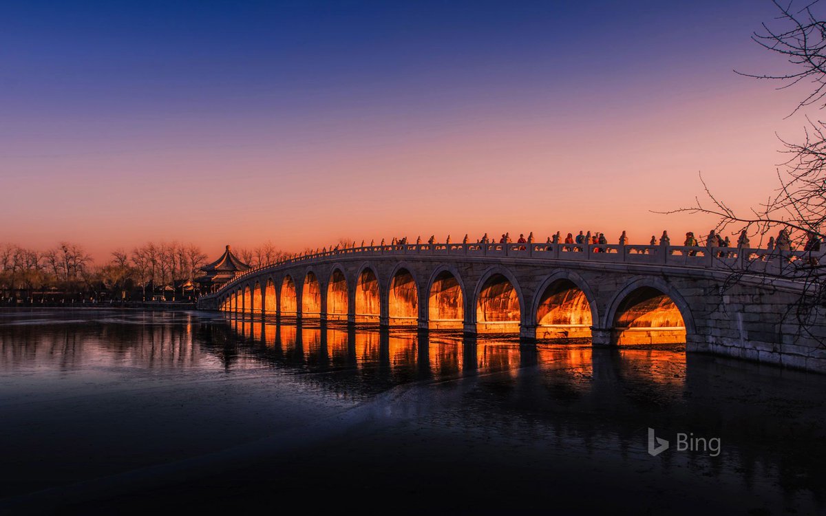 Admire the glow of Beijing's Seventeen-Arches Bridge, built during the Qing dynasty of China.