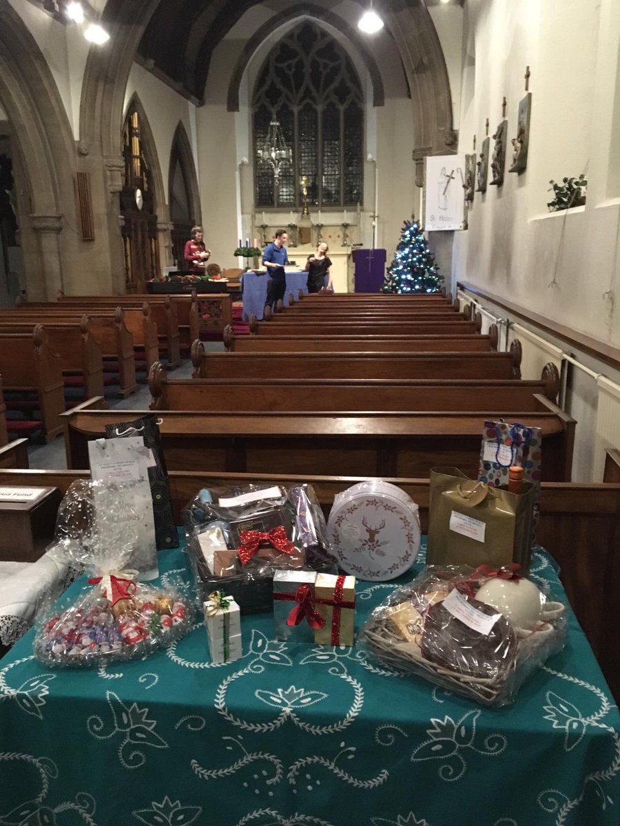 Raffle table looking nice and full for tonight’s concert at St. Helen’s with ⁦@phillipamezzo⁩ @robertj_90 and Kirsten Barker! #feelingChristmassy #musicwithfriends #choirfavourites