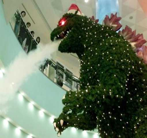 HallowsHaunts's tweet photo. Giant Godzilla Christmas Tree from the Aqua City Odaiba shopping mall in Tokyo. 
#Godzilla #Japan #Tokyo #Christmas https://t.co/D3I2LDF9W0