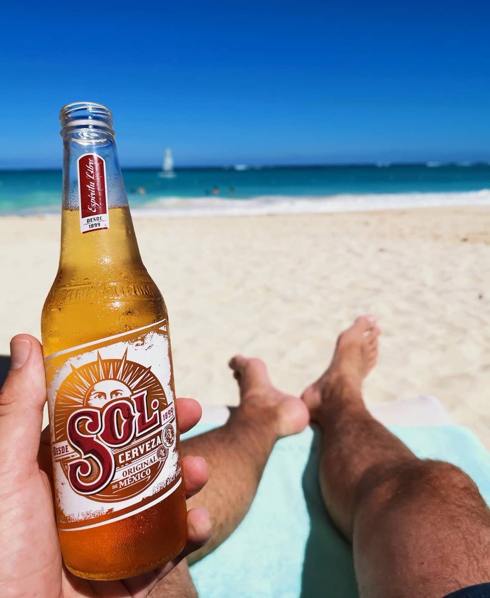 cheapcaribbean's tweet photo. Sippin' on sunshine in dreamy #PuntaCana. ☀️🍺 #SolCerveza #BeachViews #Mood https://t.co/RAa1SR3Og0