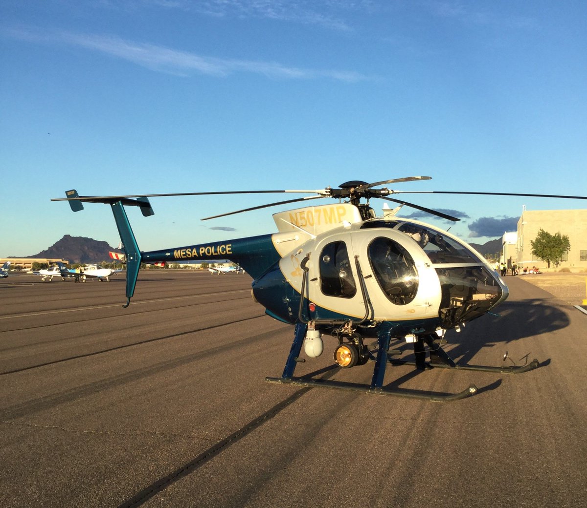 MDHelicopters's tweet photo. Shout out to our neighbors, @mesapd, who live just across the way at @FalconFieldAZ! #MesaPD operates this *#MD530F along with two other #MDhelos to support #lawenforcement operations in and around the @cityofmesa.
#backtheblue #LEAviation #falconfield https://t.co/xEtMnaivKb