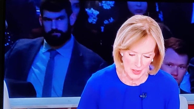 thehill's tweet photo. Bearded man behind debate moderator goes viral as #debatedaddy https://t.co/eqrb4VTKa3 https://t.co/3pl965DKdk